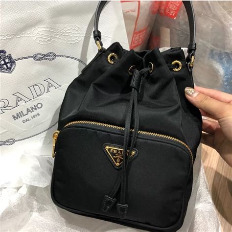 prada fabric shoulder bag bucket bag|miuccia prada shoulder bag.